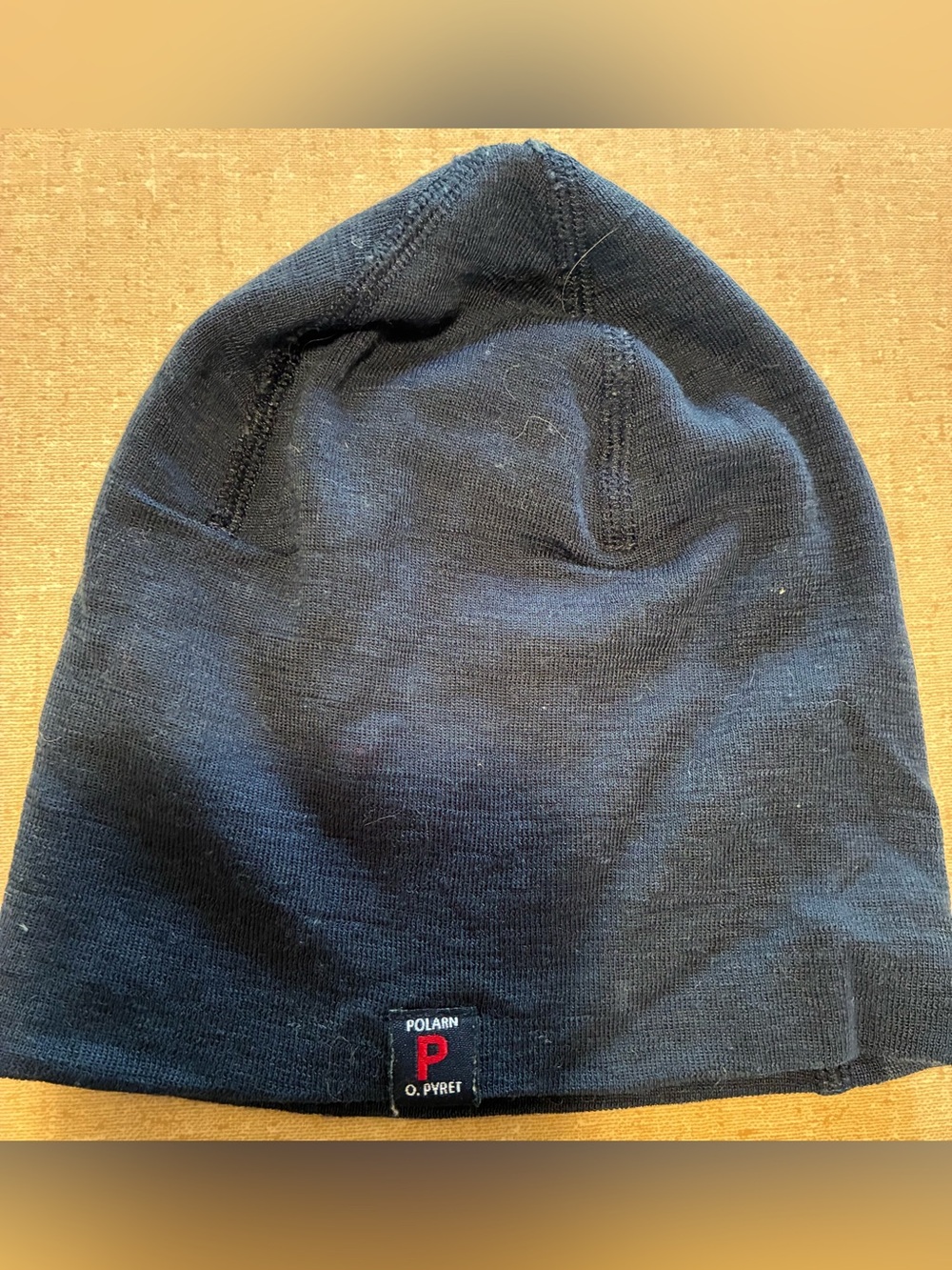 Polarn O. Pyret Navy Knit Beanie with Red Logo Tag